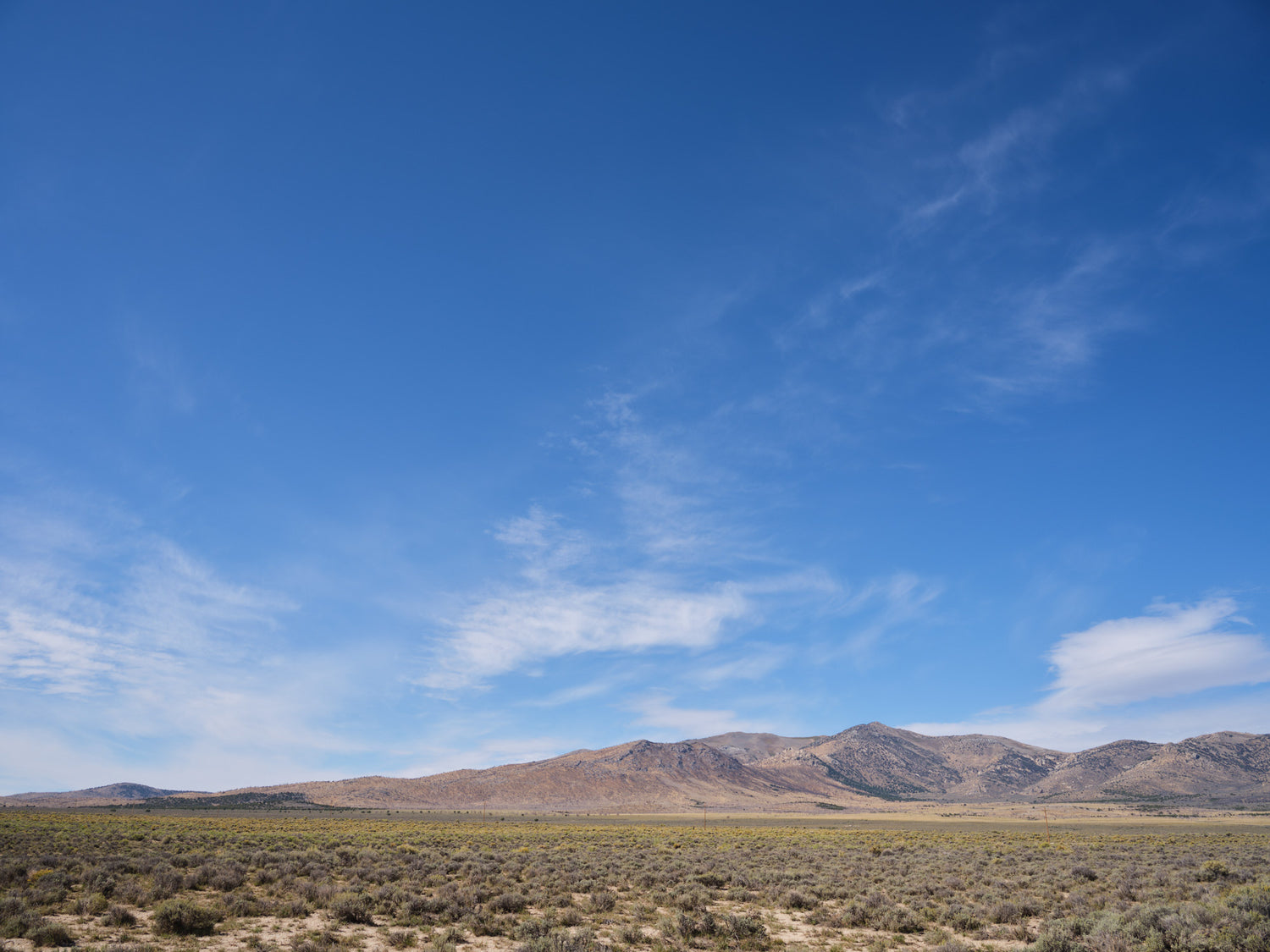 Blue Skies w/ Light Density Clouds